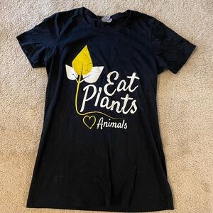 Black Graphic Tee with Yellow Leaf Design